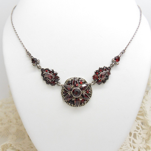 Faux garnet and marcasite starburst necklace marked 935