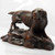 Beautifully carved Black Forest retriever standing on 'Outcrop' base.