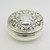 Beautifully embossed circular silver pill pot with gilding London 1990 W I Broadway and co