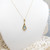 9ct yellow gold topaz set pendant on 16" fine chain marked 9kt