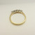 Diamond set five stone ring marked 18ct Size O