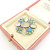 Beautiful arts & crafts enamel flowers & moonstone set brooch