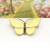 Vintage silver & yellow enamel butterfly brooch by Aksel Holmsen
