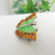 Vintage orange & green enamel butterfly brooch marked Sterling Silver