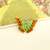 Vintage orange & green enamel butterfly brooch marked Sterling Silver