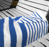Oxford Tropical Stripe Pool Towels Blue laid out