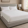 Martex Basketweave top sheet on a hotel bed.
