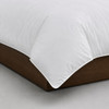 Martex Millennium solid white duvet cover detail image of the bed corner.