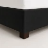 Commercial-quality black box spring wrap, hospitality-grade fabric bed base cover for wholesale hotel and lodging supply.