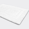 Gryphon Bath rug in white slanted