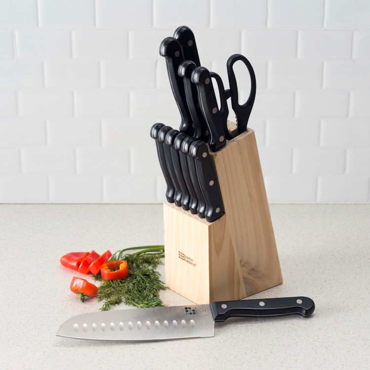 https://cdn11.bigcommerce.com/s-q0oajb576s/images/stencil/1280x1280/products/1233/3468/home-basics-13-pc-knife-block-sets-shown-on-kitchen-counter-1__94841.1637184253.jpg?c=1?imbypass=on