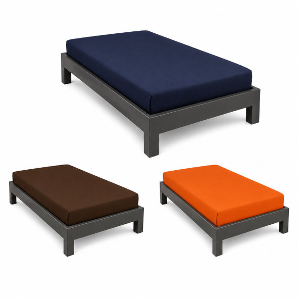 Orange, brown and navy colored prison sheets on beds