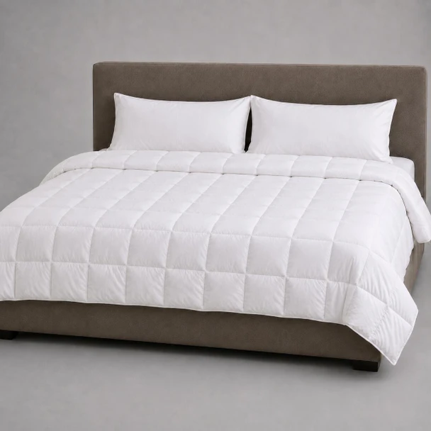 Martex Down Alternative Comforter on a bed.