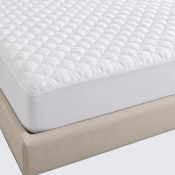 Waterproof mattress pad with a fitted poly/cotton bed skirt.