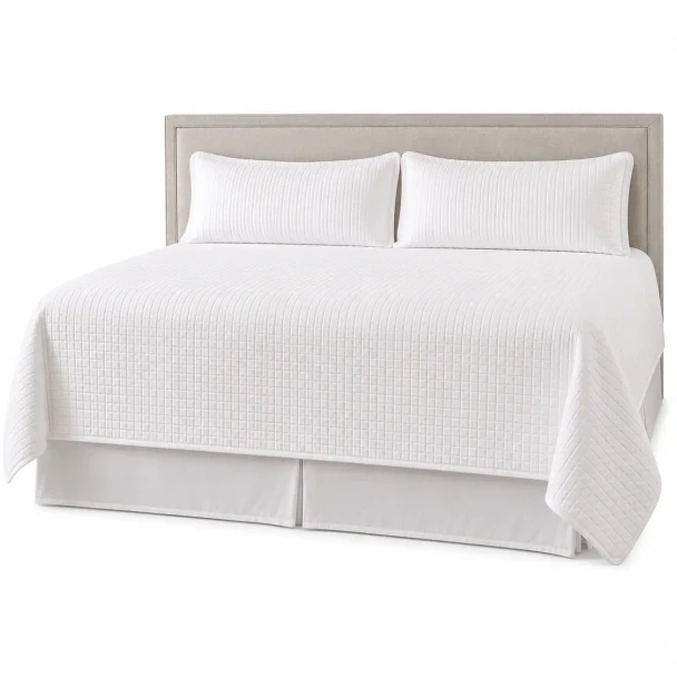 A Palmetto white king size quilted coverlet set.