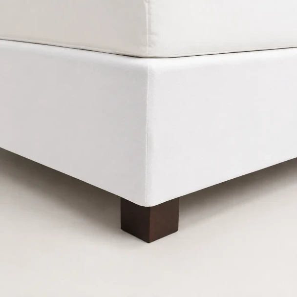 White hospitality-grade box spring wrap, commercial-quality wholesale fitted bed base cover for hotel bedding.