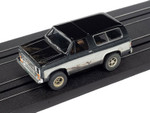 Auto World 1977 Chevrolet Blazer (Black/White) X-Traction R1 HO Slot Car