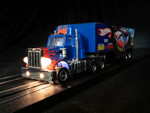 Auto World Racing Rig Peterbilt Model 359 w/Race Trailer (Snake II vs. Mongoose II) X-Traction Flamethrowers R12 HO Slot Car