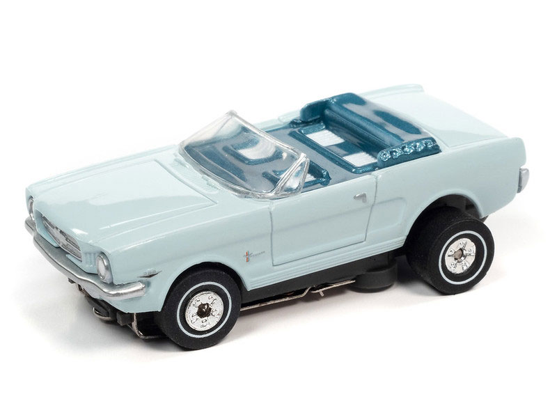 This is the Auto World 1965 Ford Mustang Convertible (Blue) Thunderjet HO Slot Car
