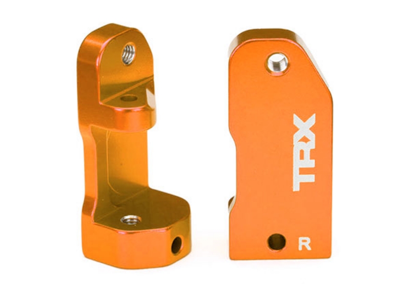 These are the Traxxas Caster Blocks, 30-degree, Orange-Anodized 6061-T6 Aluminum (2)