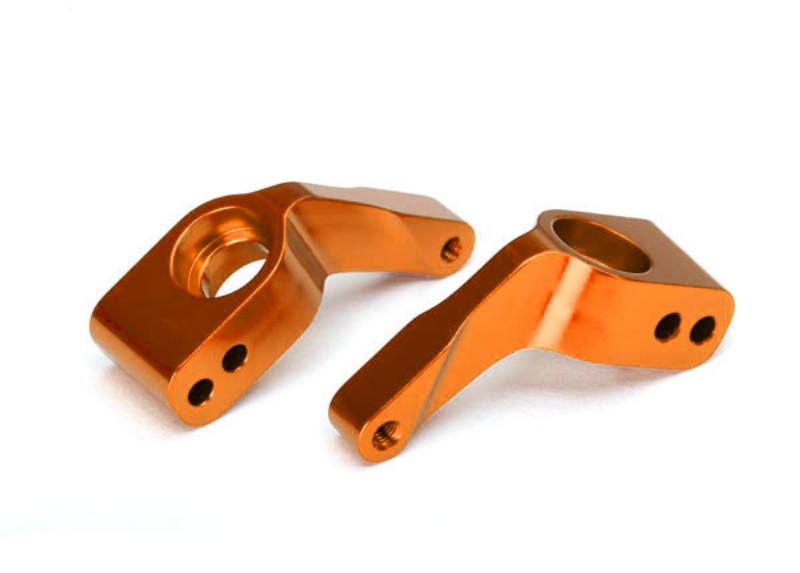 These are the Traxxas Stub Axle Carriers, 6061-T6 Aluminum (Orange-Anodized) (2)