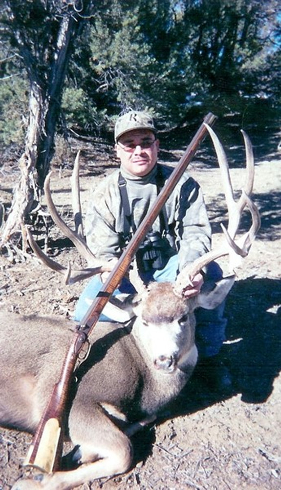 Primitive weapon smoke pole hunting mule deer.