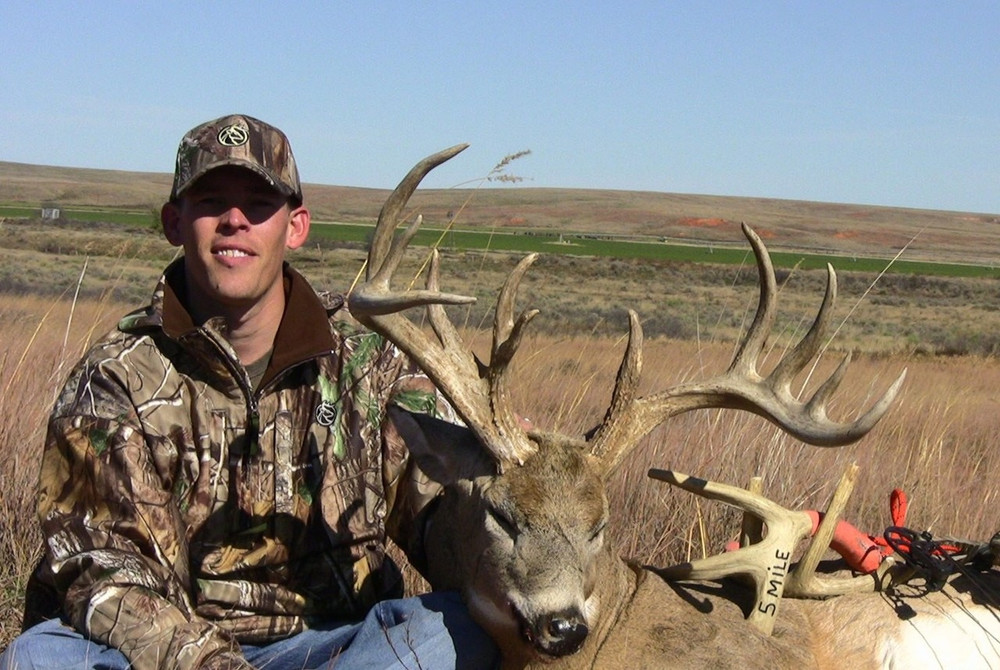 This whitetail buck got caught on the alfalfa fields.