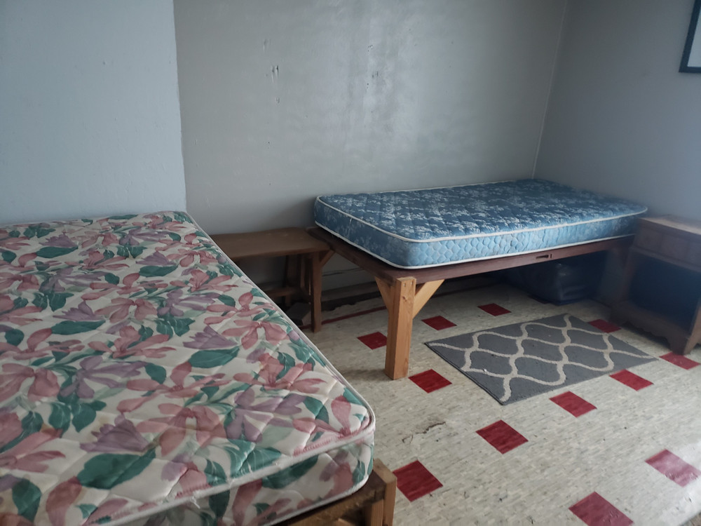 Hunting cabin sleeping quarters.