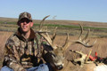 This whitetail buck got caught on the alfalfa fields.