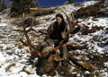 This gal showed the sportsmen what a sportswoman can do elk hunting.