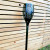 POWERplus Dragon - Solar Garden Light against fence