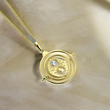 Click to view product details and reviews for Harry Potter Sterling Silver Gold Plated Time Turner Necklace With Crystal Elements.