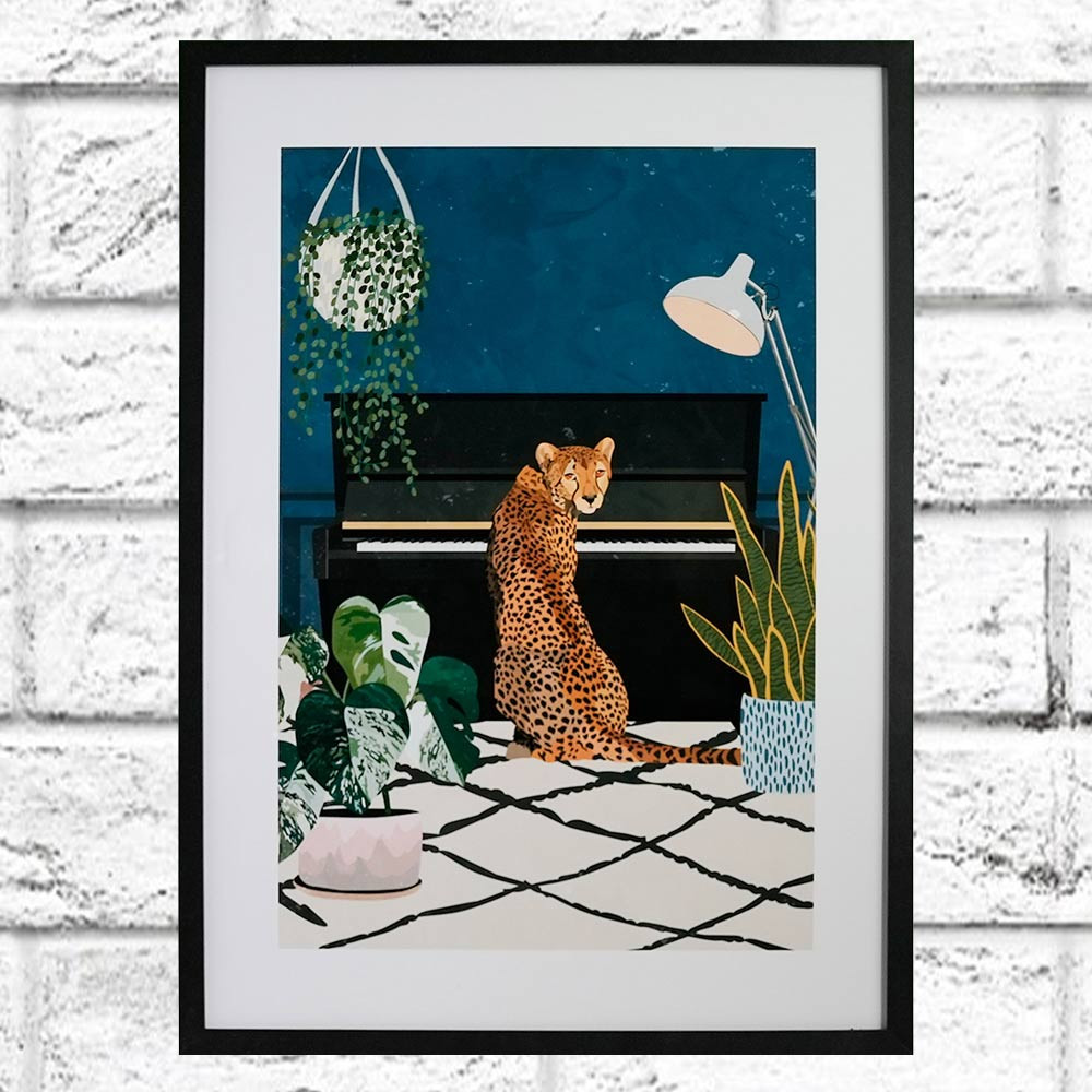 Cheetah Playing Piano Sarah Manovski Framed Print