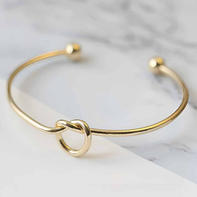 Click to view product details and reviews for Gold Knot Bangle.