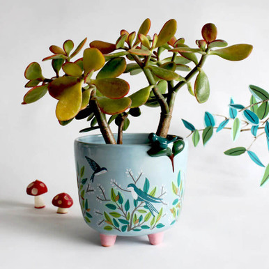 Click to view product details and reviews for Disaster Design Secret Garden Bird Planter.