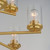Corona 28 Inch 9 Light Multi-Tier Chandelier – Satin Brass
