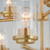 Corona 28 Inch 9 Light Multi-Tier Chandelier – Satin Brass