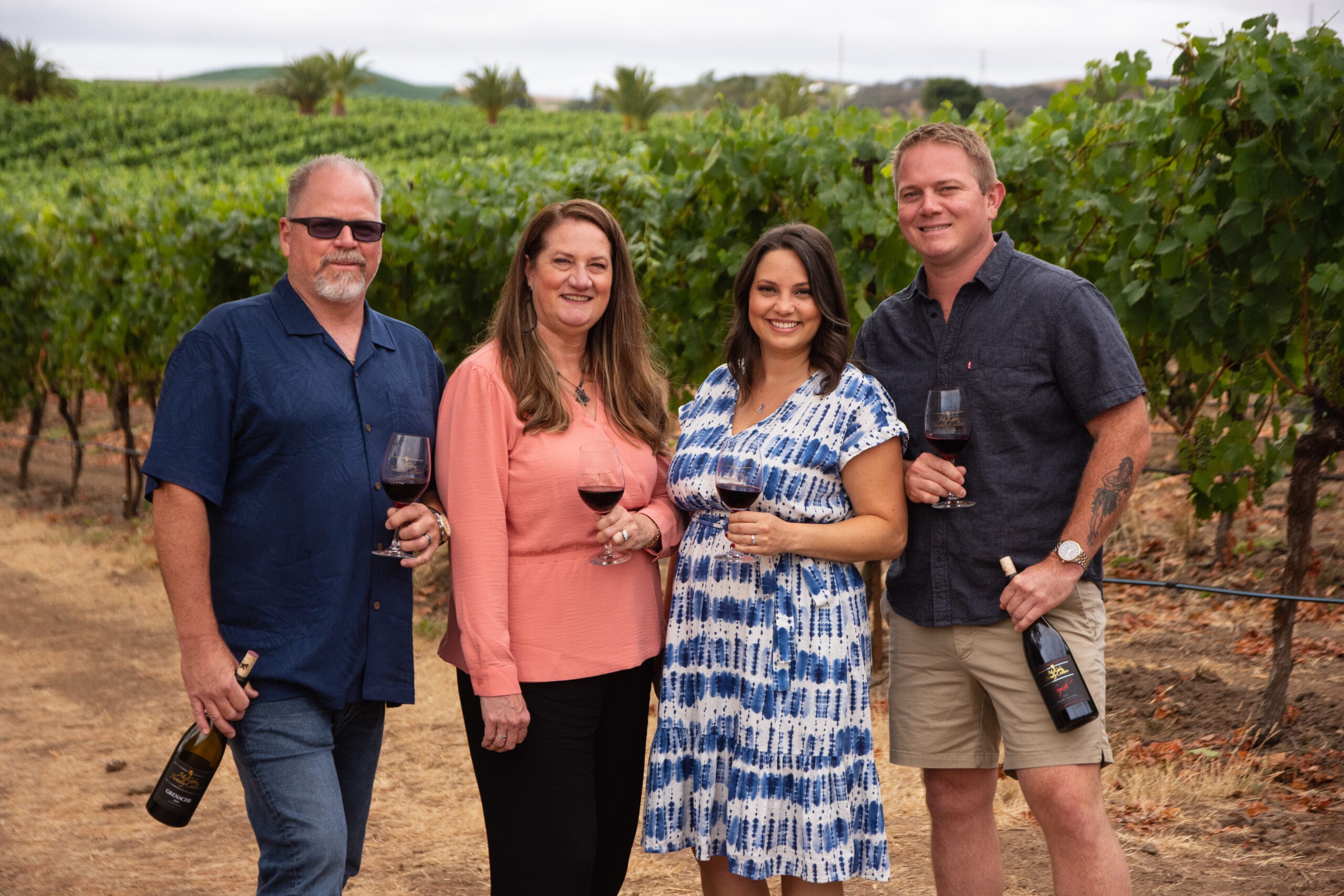 The McKahn family in the vineyard
