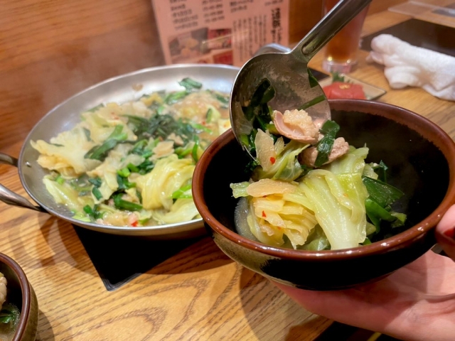 From the shared pot to a bowl held in one hand.