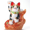 Japanese Maneki neko Lucky cat Kutani yaki Tortoiseshell cat Riding red snapper fish from Japan