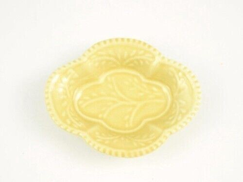 Arita yaki porcelain Japanese small plate Teshio-zara Yellow glaze Mokko Shape