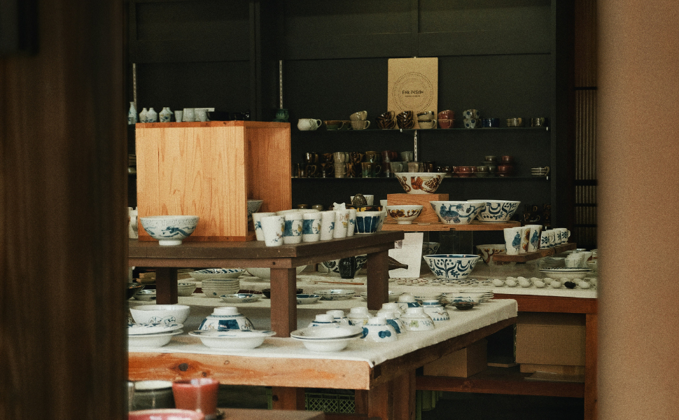 Interior of a ceramics shop in Arita with bowls and cups on wooden tables