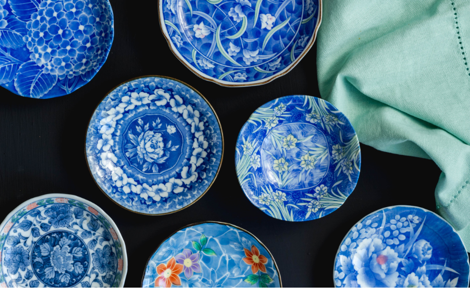 Blue and white Arita ware plates with floral patterns