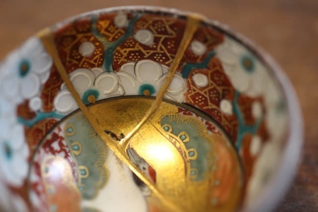 Japanese ceramic with gold foil detail - kintsugi philosophy of golden repair