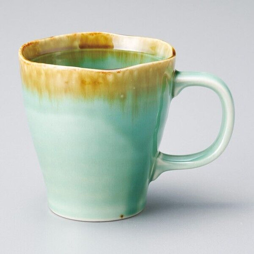 A Mino ware mug in a deep emerald-green hisui glaze — an everyday coffee and tea cup made in Toki