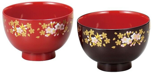 A pair of Yamanaka lacquered soup bowls in red and black with cherry blossom design