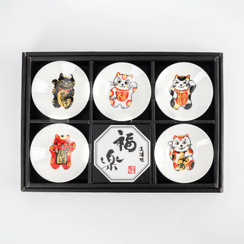 A boxed set of five Mino ware sakazuki cups painted with maneki neko lucky cats