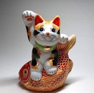 Japanese Maneki neko Lucky cat Kutani yaki Tortoiseshell cat Riding red snapper fish from Japan