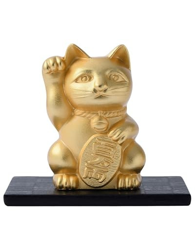A beckoning cat (maneki-neko) cast in Takaoka metal with a gold finish