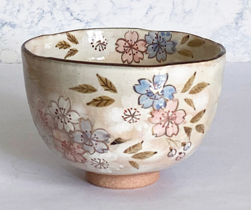 A Kyo-Kiyomizu ware matcha chawan with hand-painted cherry blossoms